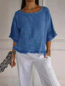 Blusinha Bellatriz™ com babado, manga larga e caimento solto, feita de algodão, para mulheres modernas, na cor preta.