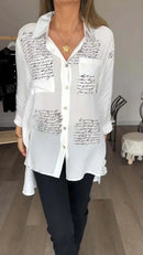 Camisa de seda ModernLar Poema com detalhes elegantes, caimento perfeito e acabamento sofisticado, ideal para um estilo refinado.