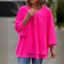 Blusa Margiela™ com decote V regulável, barra em duas camadas, feita de tecido leve e versátil, cor neutra.