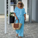 Conjunto Céliane™ em linho de algodão da ModernLar com caimento solto, tecido leve e confortável, em tom neutro.