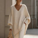 Suéter Genebra™ em tricô macio da ModernLar, modelo oversized com gola e mangas largas, em tom neutro.