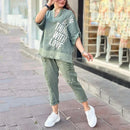 Conjunto Vogue Street™ em linho de algodão com estampa metalizada e calça cargo bordada, estilo contemporâneo e confortável.
