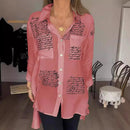 Camisa Poema de Seda™ da ModernLar, com detalhes elegantes, caimento perfeito e estilo sofisticado, exibida em close na imagem.