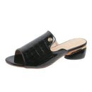 Mule Croco Bella™ em couro texturizado com salto bloco baixo, estilo elegante e confortável para compor looks modernos.