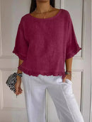 Blusinha Bellatriz™ com babado, mangas bufantes e caimento solto em algodão, confortável e moderna para mulheres.