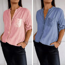 Camisa Ortência™ da ModernLar com brilho em strass luxuoso, tecido elegante, modelo feminino, detalhe de acabamento brilhante em vista frontal.