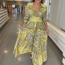 Vestido longo Aisha™ em viscose premium com decote em V, modelo elegante da ModernLar, exibido em fundo branco.