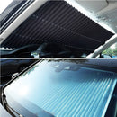 Tela protetora automotiva retrátil UVShield da Viva Lar, com proteção UV, instalada em carro com detalhes visíveis.