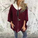 Casaco Georgia Flair™ com gola contrastante, modelagem ampla e estilo urbano, em tecido confortável e moderno.