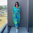 Vestido Oceania™ da ModernLar em viscose com corte amplo e estampa tropical, ideal para conforto e estilo casual.