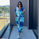 Vestido Oceania™ da ModernLar em viscose com corte amplo e estampa tropical, ideal para conforto e estilo casual.
