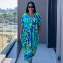 Vestido Oceania™ da ModernLar em viscose com corte amplo e estampa tropical, ideal para conforto e estilo casual.