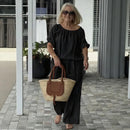 Conjunto Céliane™ em linho de algodão com caimento solto, roupa confortável e elegante da marca ModernLar, cor clara.