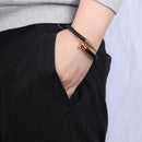 Bracelete Nailor Preto/Dourado